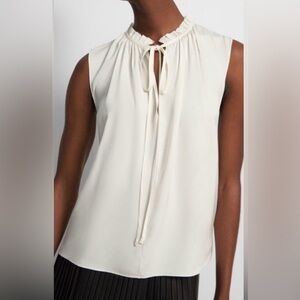 Theory Ivory Tie-Neck Sleeveless Blouse, 100% silk.